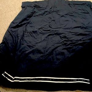 Two twin duvet covers with down comforters inside. Easy zip off for cleaning.